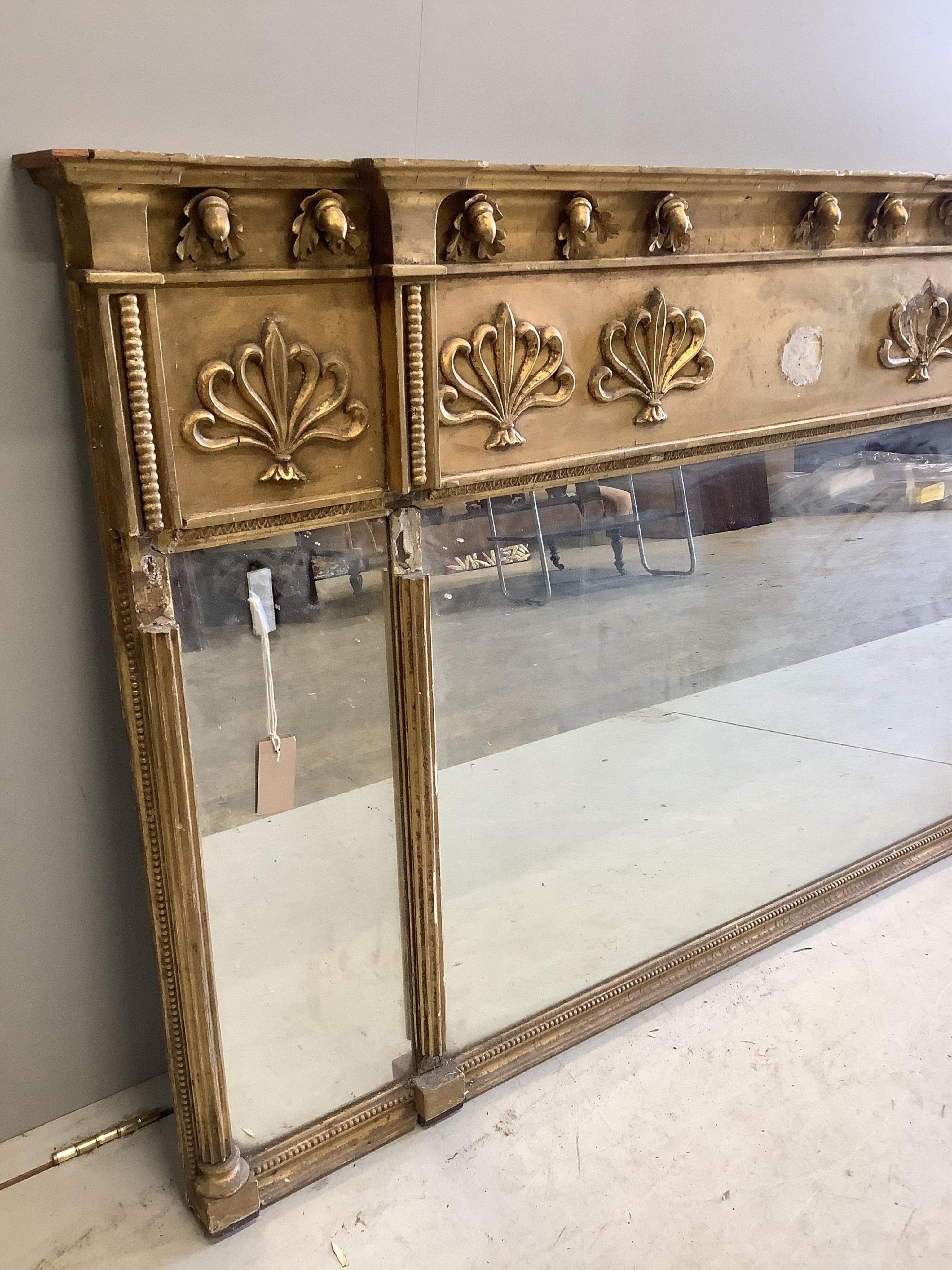 A Regency giltwood and composition triple plate overmantel mirror, width 161cm, height 94cm. Condition - poor, in need of restoration